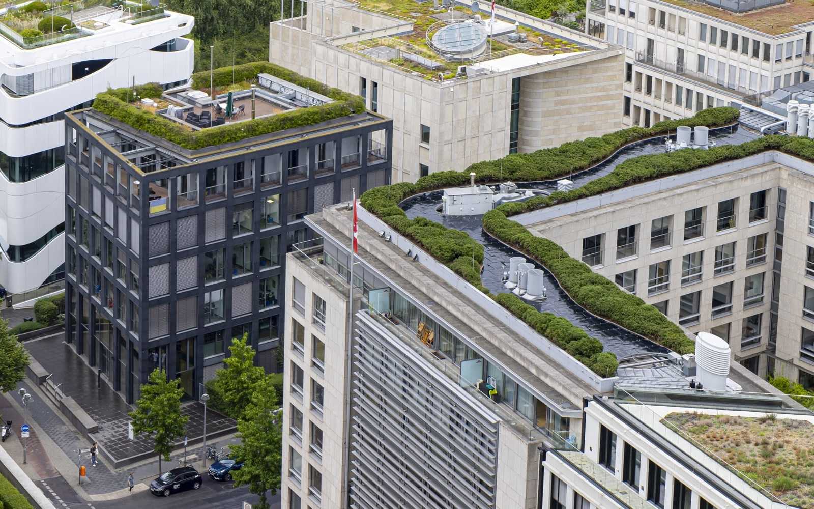 sustainable green roofs on office and residential buildings in an urban core